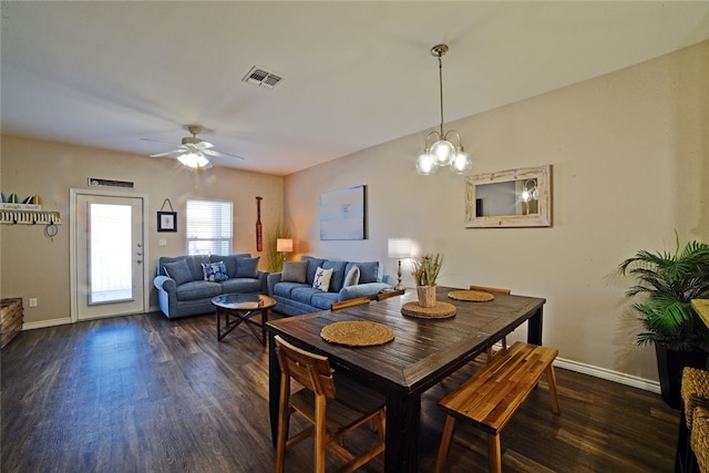 dining area with dark hardwood / wood-style floors and ceiling fan