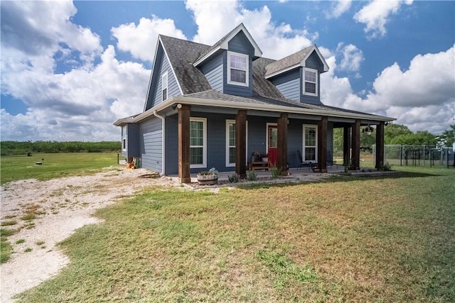 11766 Fm 70, Robstown, TX 78380 - view of front of property with dirt driveway, a porch, and roof with shingles