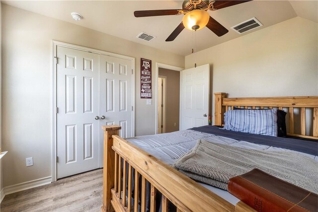 11766 Fm 70, Robstown, TX 78380 - bedroom with wood finished floors, ceiling fan, and a closet