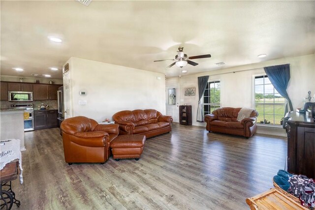 11766 Fm 70, Robstown, TX 78380 - living area featuring dark wood-style floors, a ceiling fan, and recessed lighting