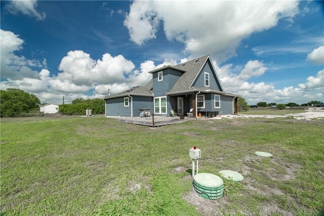 11766 Fm 70, Robstown, TX 78380 - rear view of property with a yard, a deck, and roof with shingles