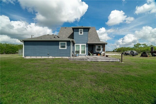 11766 Fm 70, Robstown, TX 78380 - rear view of house with a yard, a wooden deck, and roof with shingles