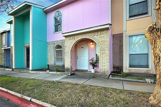 6702 Everhart Unit H104, Corpus Christi, TX 78413 - view of front of home featuring brick siding