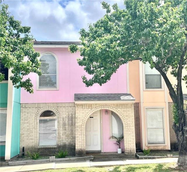6702 Everhart Unit H104, Corpus Christi, TX 78413 - view of property featuring brick siding