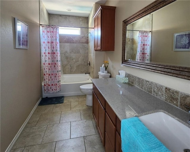 14878 Granada Dr Unit 502, Corpus Christi, TX 78418 - full bathroom featuring toilet, tile patterned floors, vanity, shower / tub combo with curtain, and baseboards