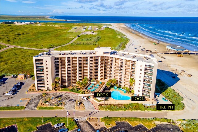 aerial view featuring a view of the beach and a water view