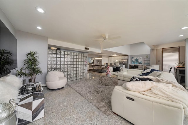 1400 Ocean Dr Unit 1104A, Corpus Christi, TX 78404 - living room featuring speckle patterned floor, a ceiling fan, and recessed lighting