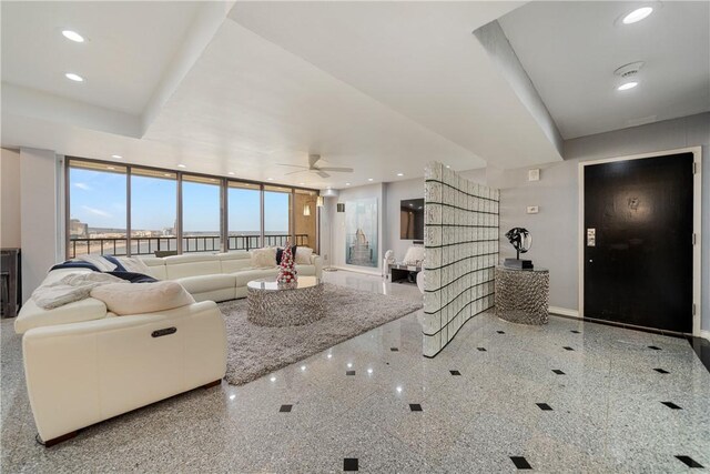 1400 Ocean Dr Unit 1104A, Corpus Christi, TX 78404 - living area featuring ceiling fan, recessed lighting, granite tiled floors, and plenty of natural light