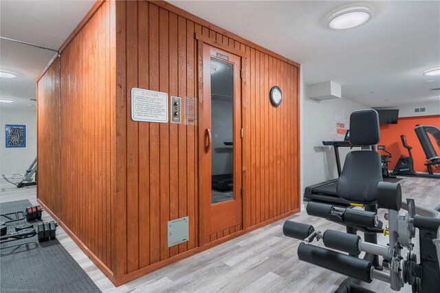 1400 Ocean Dr Unit 1104A, Corpus Christi, TX 78404 - workout area with wooden walls and wood finished floors