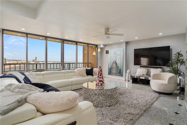 1400 Ocean Dr Unit 1104A, Corpus Christi, TX 78404 - living area featuring a ceiling fan, granite floors, recessed lighting, and plenty of natural light