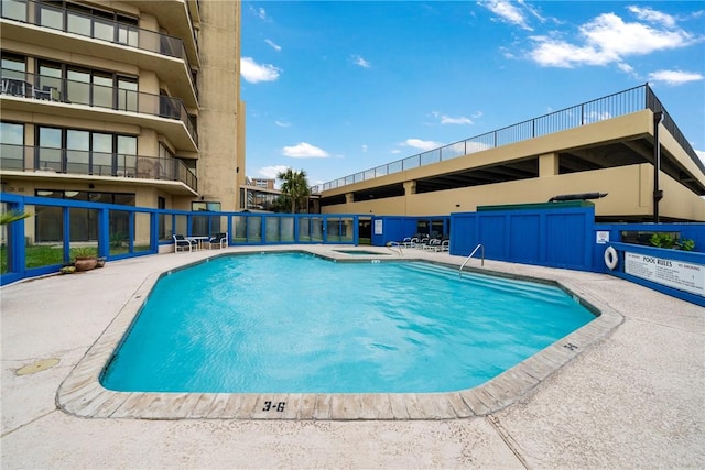 1400 Ocean Dr Unit 1104A, Corpus Christi, TX 78404 - community pool featuring a hot tub