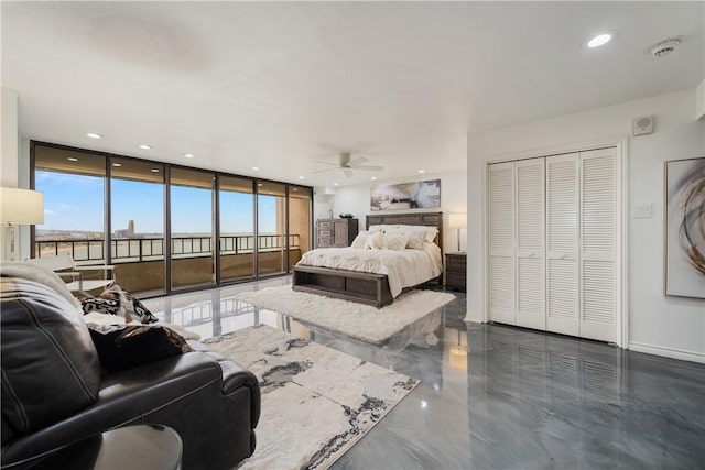 1400 Ocean Dr Unit 1104A, Corpus Christi, TX 78404 - bedroom featuring access to outside, multiple windows, recessed lighting, a wall of windows, and a closet