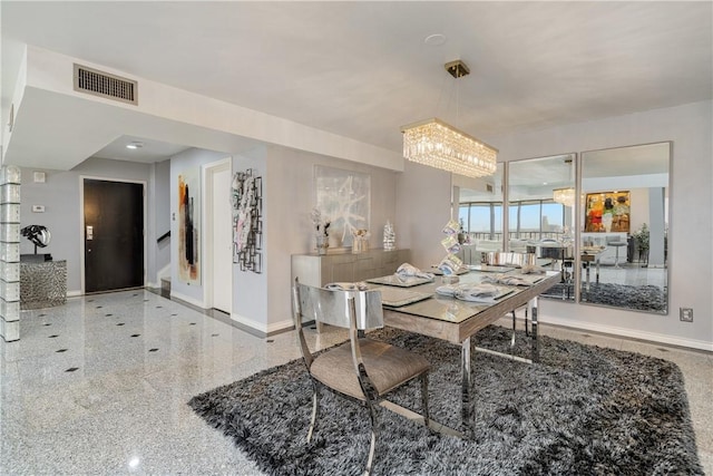 1400 Ocean Dr Unit 1104A, Corpus Christi, TX 78404 - dining room with baseboards and a chandelier