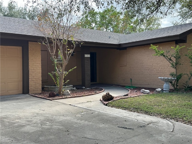 property entrance with a garage