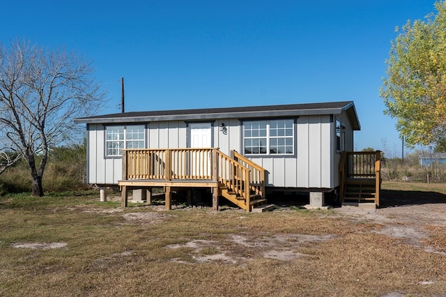181 W Post Oak Ln, Rockport, TX 78382 - view of front of home with a deck