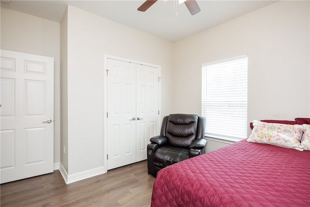 bedroom featuring a closet, ceiling fan, and wood-type flooring