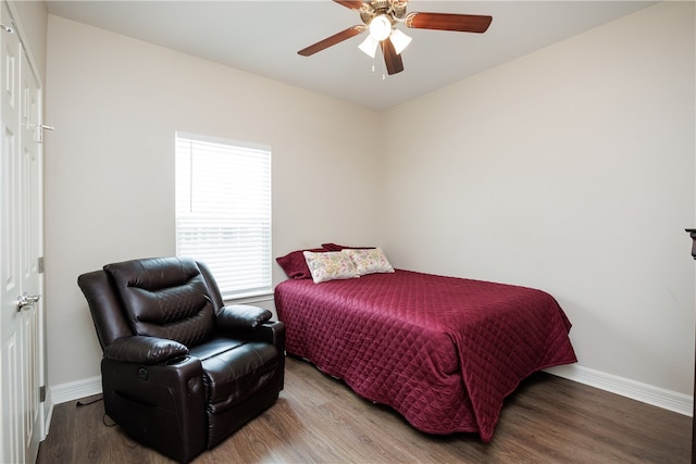 bedroom with ceiling fan and hardwood / wood-style flooring