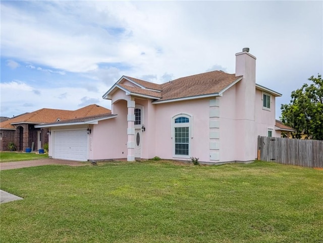 view of front of property featuring driveway, a front lawn, fence, and stucco siding