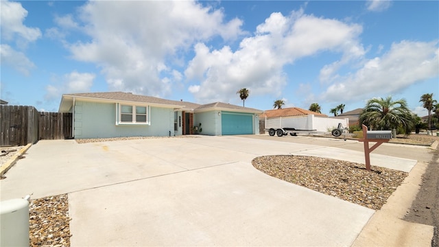 single story home featuring a garage