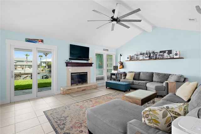 15269 Caravel Dr, Corpus Christi, TX 78418 - living room featuring a ceiling fan, plenty of natural light, light tile patterned floors, and a tiled fireplace
