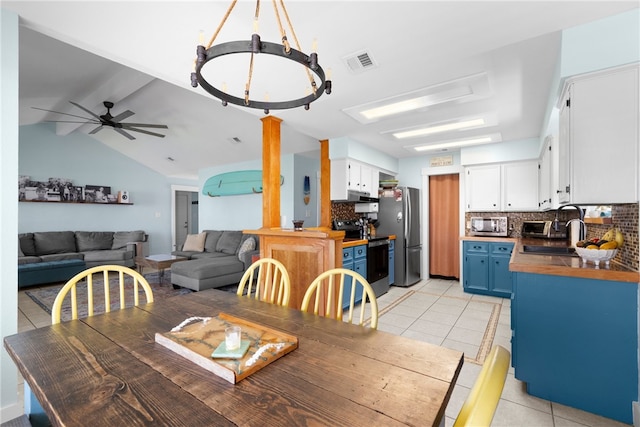 15269 Caravel Dr, Corpus Christi, TX 78418 - dining room with light tile patterned flooring, a ceiling fan, and lofted ceiling