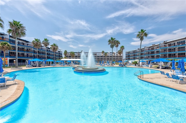 view of pool featuring pool water feature