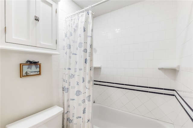 bathroom with toilet, a baseboard heating unit, and shower / tub combo