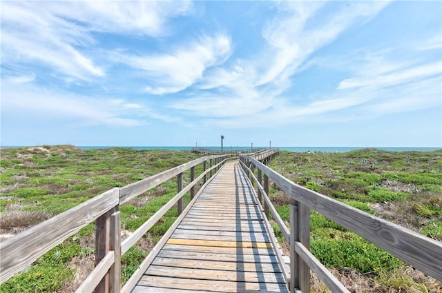 surrounding community with a water view