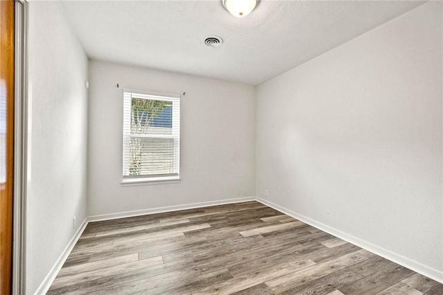 4414 Driftwood Pl, Corpus Christi, TX 78411 - spare room featuring wood finished floors and baseboards