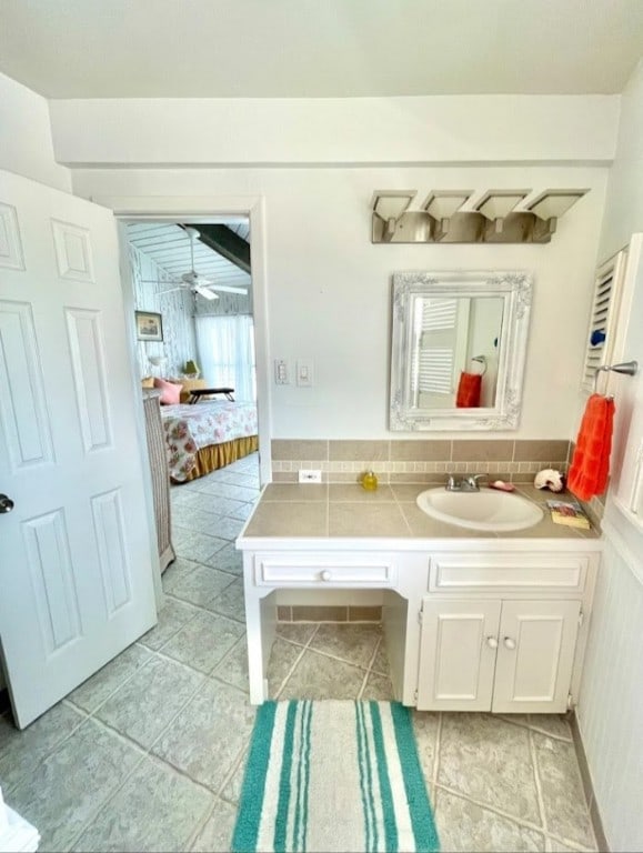 1878 Bay Shore Dr, Rockport, TX 78382 - bathroom with vanity, tile patterned floors, and ensuite bathroom
