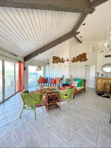 1878 Bay Shore Dr, Rockport, TX 78382 - sunroom featuring beamed ceiling