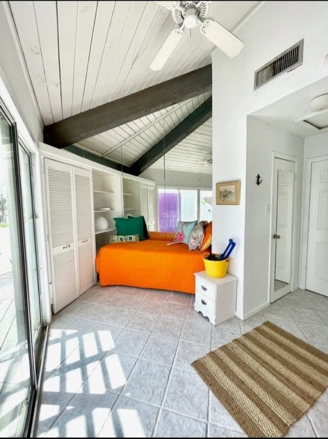 1878 Bay Shore Dr, Rockport, TX 78382 - tiled bedroom with wooden ceiling, vaulted ceiling with beams, and visible vents