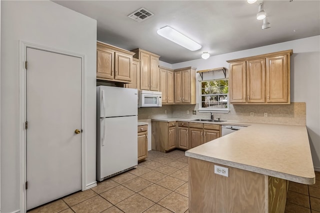 kitchen featuring kitchen peninsula, sink, light tile patterned floors, light brown cabinetry, and white appliances