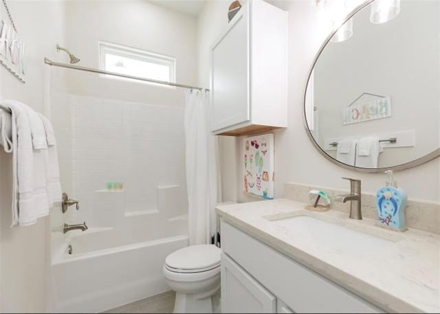 full bathroom with vanity, toilet, and shower / bath combination with curtain