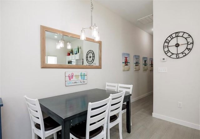 dining room featuring light wood-type flooring