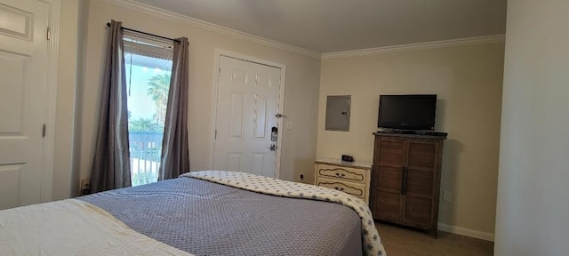 bedroom with ornamental molding and electric panel