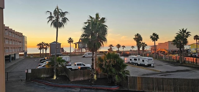 view of parking at dusk