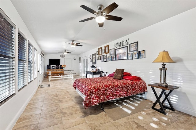 bedroom featuring vaulted ceiling and ceiling fan