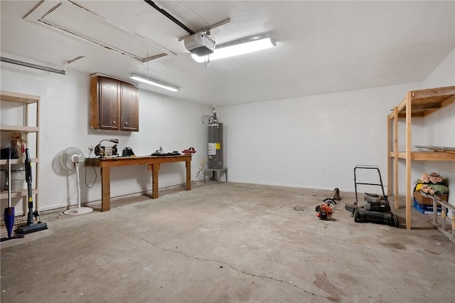 11809 Lori Dr, Corpus Christi, TX 78410 - garage with a garage door opener and electric water heater