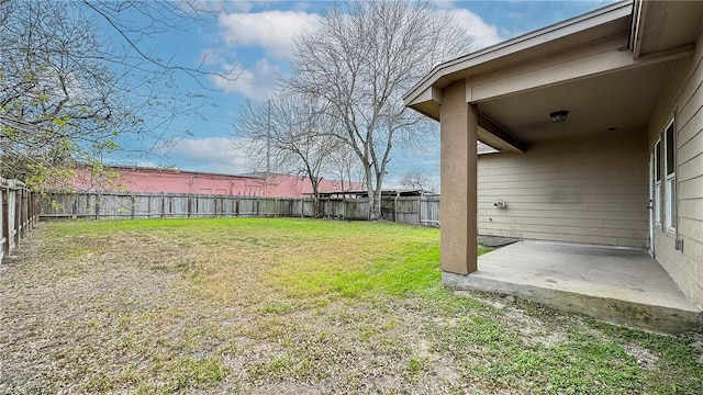 view of yard with a fenced backyard and a patio