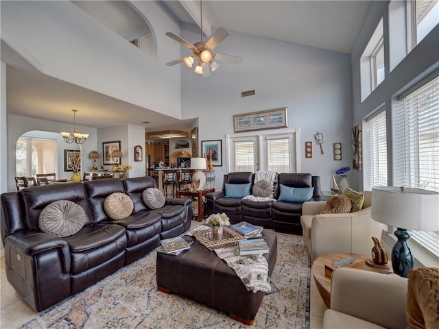 13810 Eaglesnest Bay Dr, Corpus Christi, TX 78418 - living room with high vaulted ceiling, a chandelier, a ceiling fan, and beamed ceiling