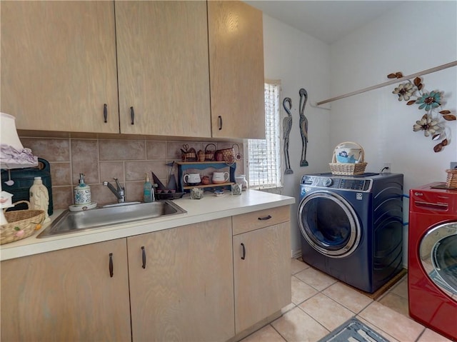 13810 Eaglesnest Bay Dr, Corpus Christi, TX 78418 - washroom with cabinet space, light tile patterned floors, and washing machine and dryer