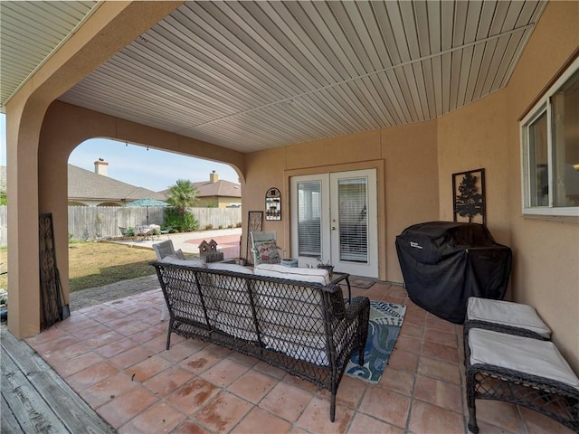 13810 Eaglesnest Bay Dr, Corpus Christi, TX 78418 - view of patio with french doors, grilling area, and an outdoor living space