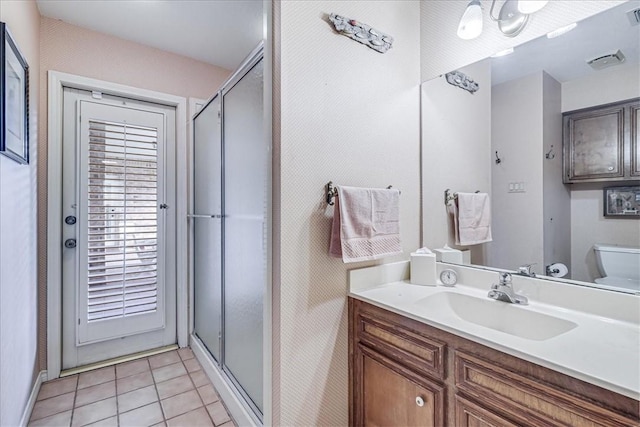 4217 Spring Creek Dr, Corpus Christi, TX 78410 - bathroom featuring tile patterned flooring, visible vents, toilet, baseboards, and a shower stall