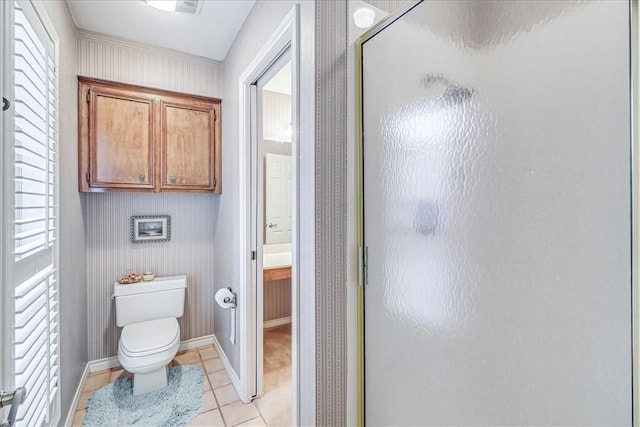4217 Spring Creek Dr, Corpus Christi, TX 78410 - full bathroom with tile patterned floors, a stall shower, a wealth of natural light, and toilet