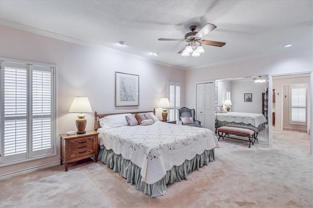 4217 Spring Creek Dr, Corpus Christi, TX 78410 - bedroom featuring a closet, ornamental molding, and light carpet