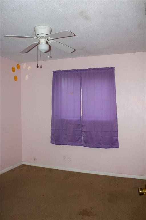 33 Encino Loma, Beeville, TX 78102 - carpeted empty room featuring a ceiling fan and a textured ceiling