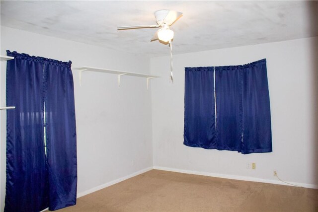 33 Encino Loma, Beeville, TX 78102 - carpeted spare room with a ceiling fan and baseboards