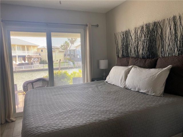 bedroom featuring multiple windows