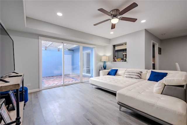27 Townhouse, Corpus Christi, TX 78412 - living area featuring wood finished floors, ceiling fan, baseboards, and recessed lighting
